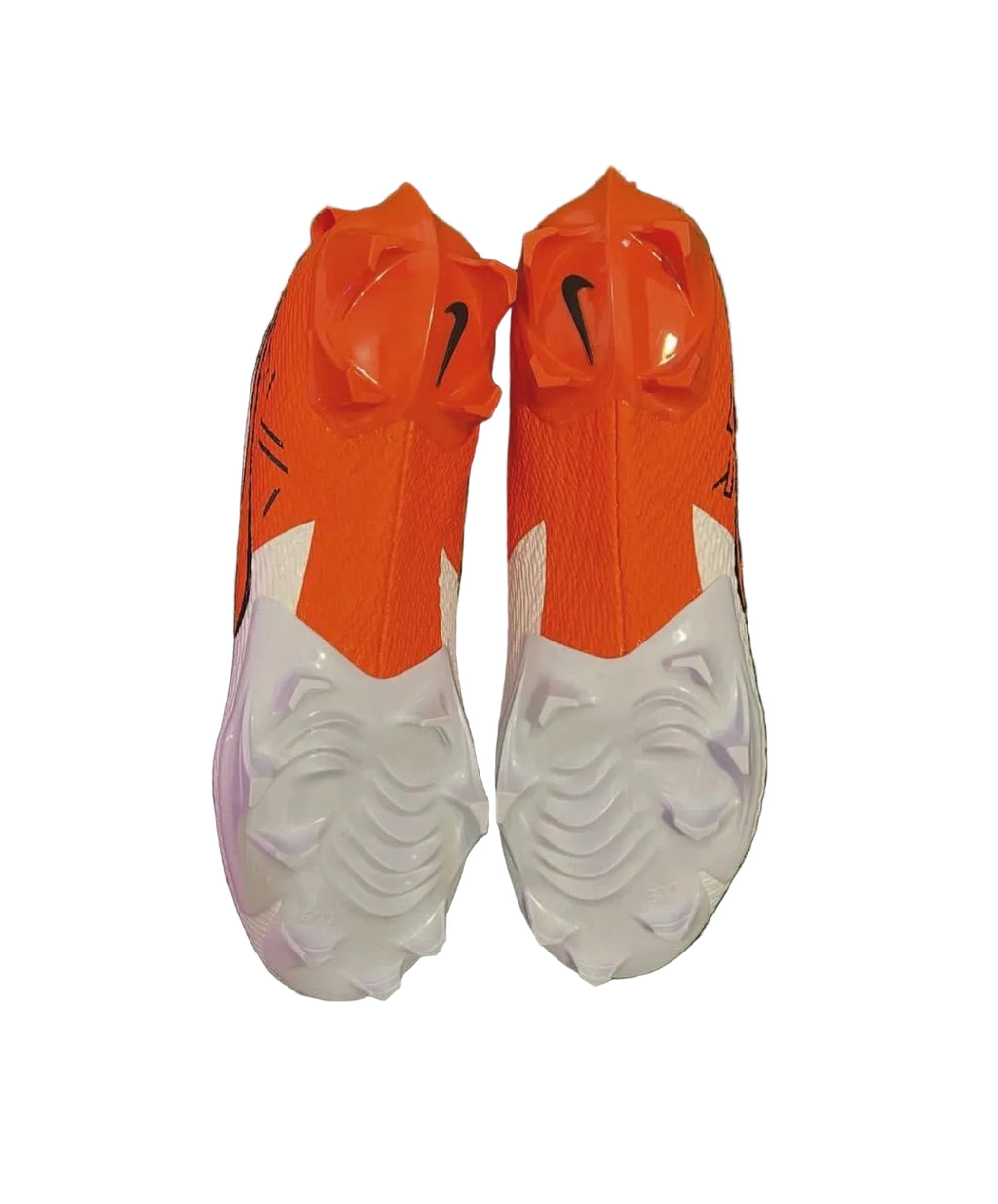 Orange and white Nike vapor